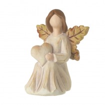 Sitting Figure With Heart & Leaf Wings